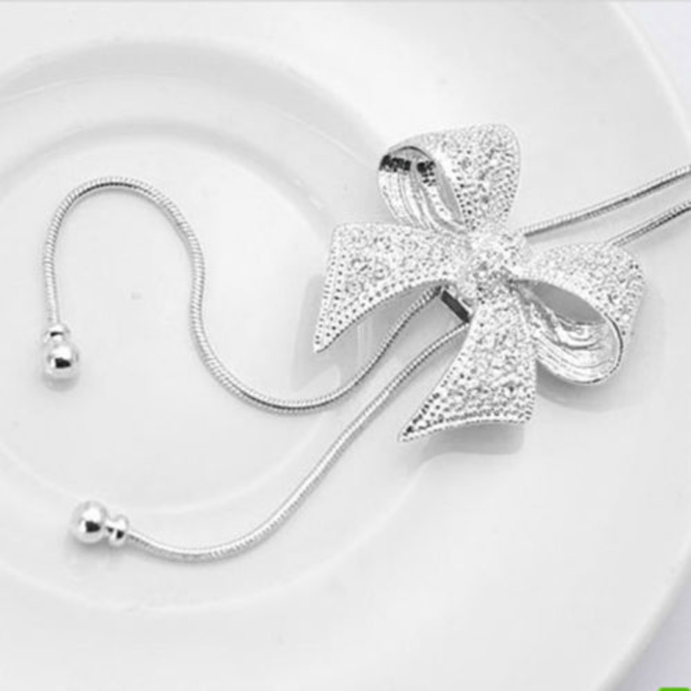 New Crystal Bow Necklace Silver Adjustable Lariat - Picture 4 of 5